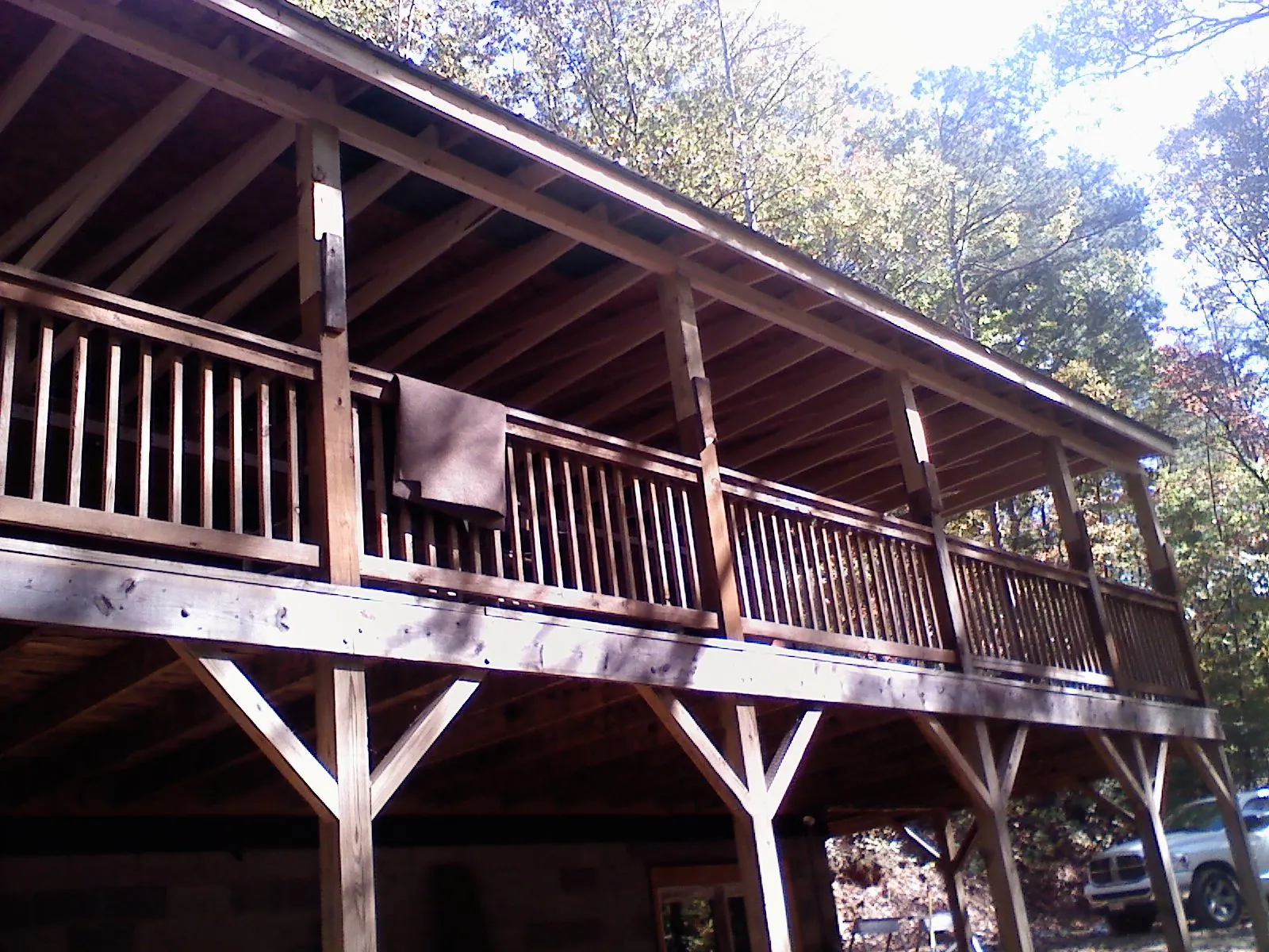 Timber framing under a new elevated porch and deck — Roof Leak Repair in Inglis by Roofing Brothers